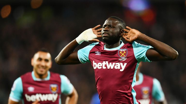 Cheikhou Kouyate of West Ham United celebrates scoring his side's first goal during the EFL Cup fourth round match v Chelsea