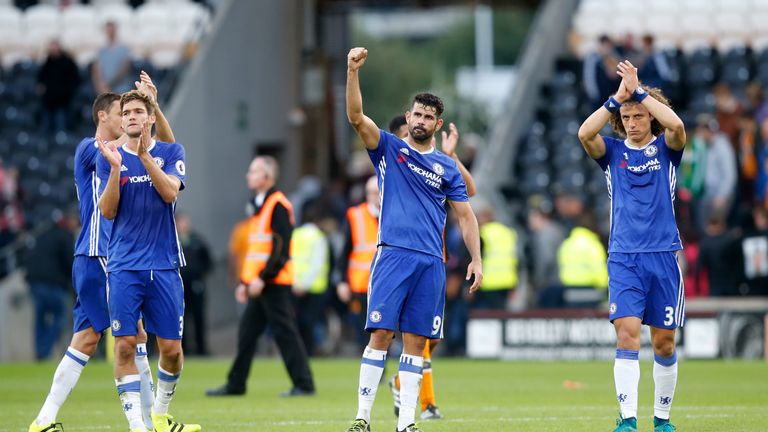 Chelsea's (left-right) Marcos Alonso, Diego Costa and David Luiz celebrate after the final whistle during the Premier League match at the KCOM Stadium, Hul