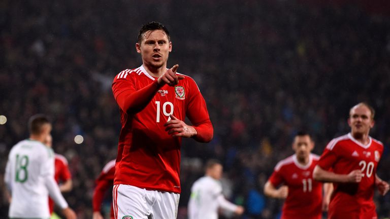 CARDIFF, WALES - MARCH 24:  Simon Church of Wales celebrates after scoring a late penalty to level the scores at 1-1 during the international friendly matc