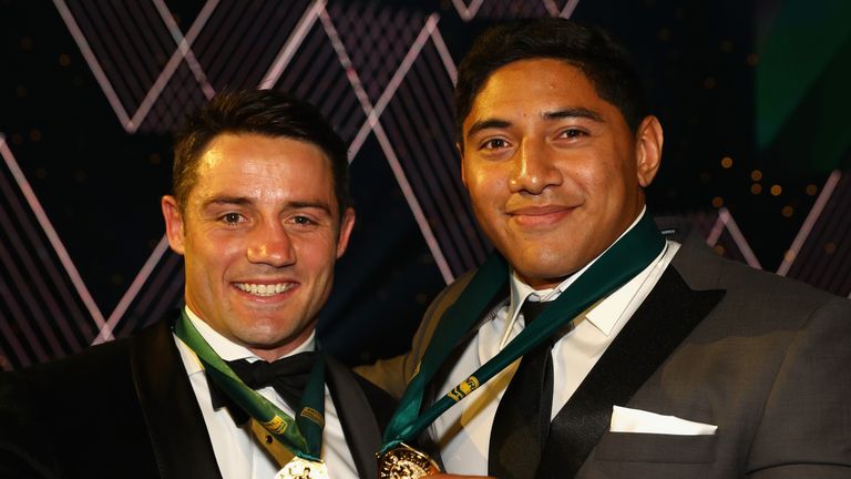 Cooper Cronk of the Melbourne Storm and Jason Taumalolo of the North Queensland Cowboys pose after being announced joint winners of the Dally M medal