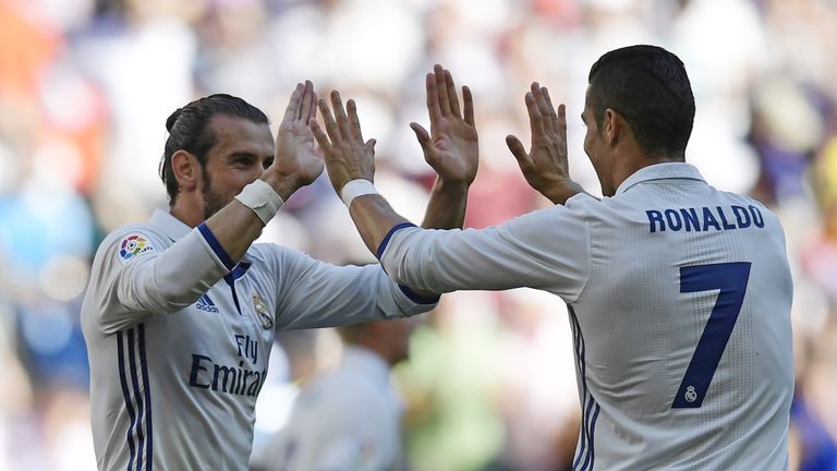 Real Madrid's Welsh forward Gareth Bale (L) and Real Madrid's Portuguese forward Cristiano Ronaldo celebrate after scoring a goal during the Spanish league
