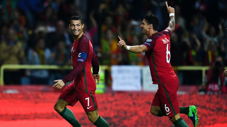 Cristiano Ronaldo  celebrates with Jose Fonte