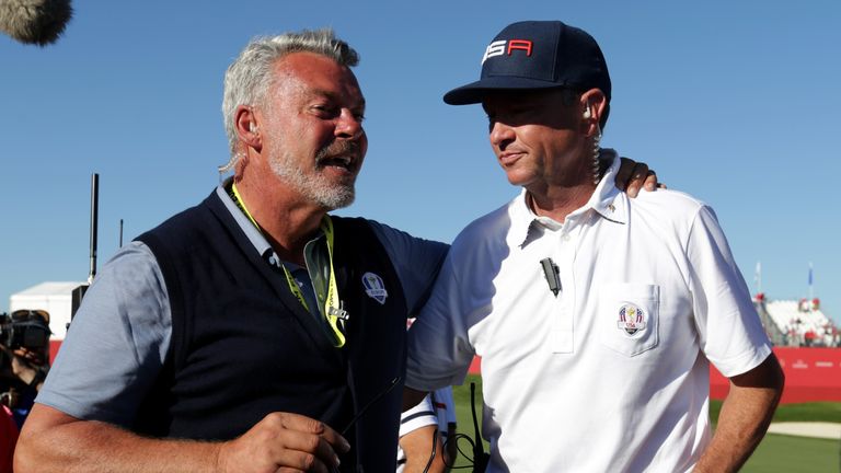 CHASKA, MN - OCTOBER 02:  Captain Darren Clarke of Europe and captain Davis Love III of the United States react after the United States defeated Europe dur