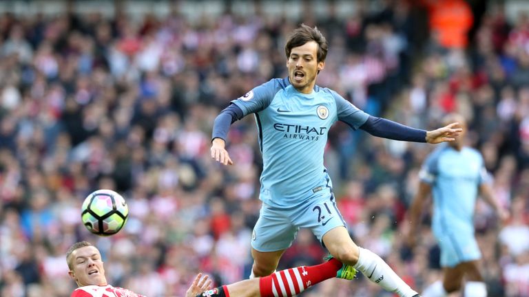 David Silva tries to avoid Jordy Clasie