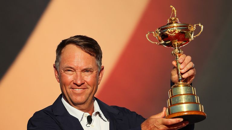 Captain Davis Love III of the United States holds the Ryder Cup 