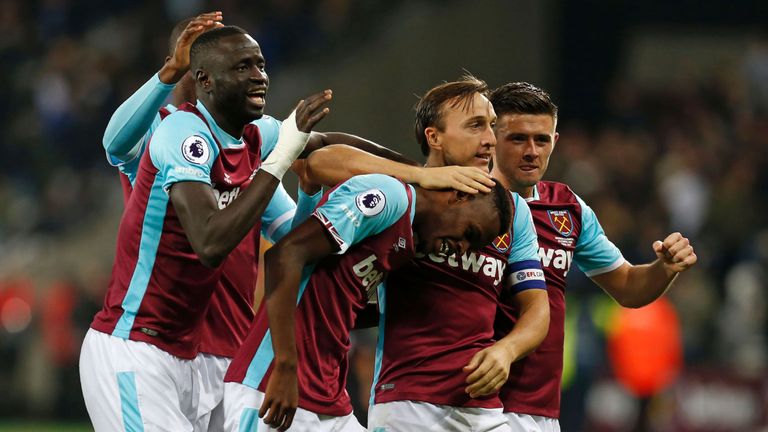 Edimilson Fernandes (C) celebrates with West Ham team-mates after scoring their second goal during the EFL Cup tie v Chelsea