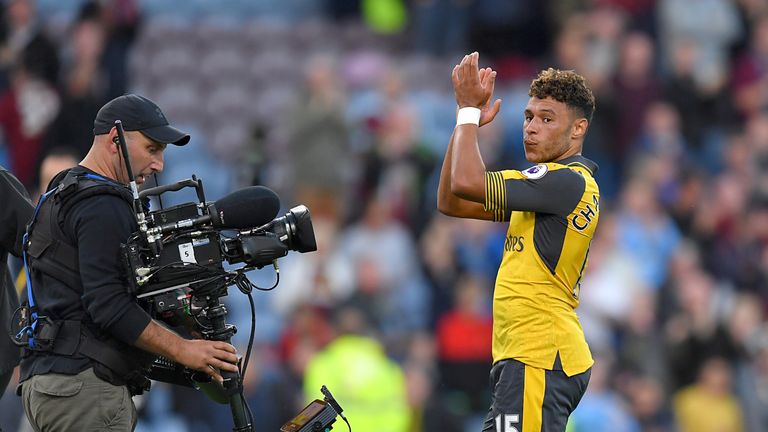 Alex Oxlade-Chamberlain applauds Arsenal fans after the final whistle at Turf Moor