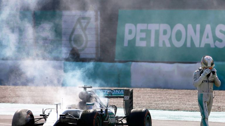 Lewis Hamilton retires from the Malaysia Grand Prix following engine failure