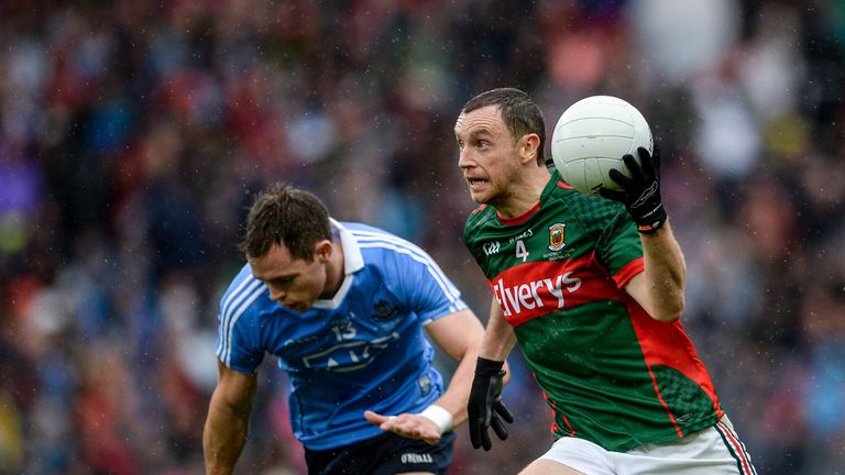 Keith Higgins is tracked by Dean Rock of Dublin