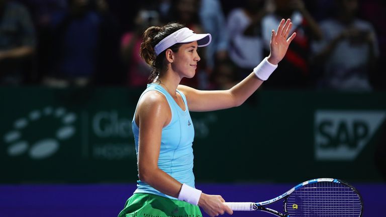 SINGAPORE - OCTOBER 28:  Garbine Muguruza of Spain celebrates victory in her singles match against Svetlana Kuznetsova of Russia during day 6 of the BNP Pa