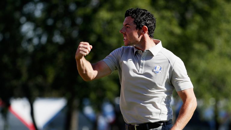 Rory McIlroy of Europe reacts to a putt on the ninth green