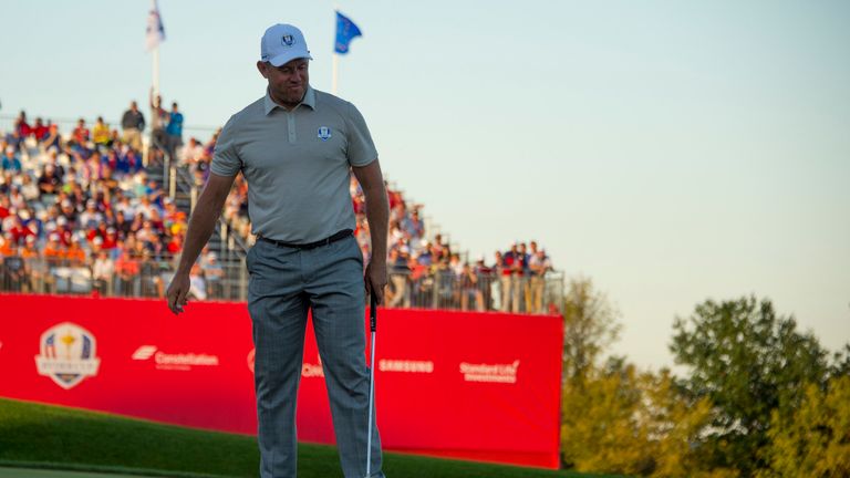 Lee Westwood reacts to missing his putt and losing the match during the fourball matches