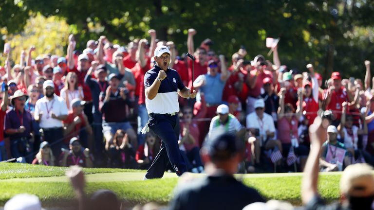 Patrick Reed of the United States reacts on the 12th green during singles matches of the 2016 Ryder Cup at Hazeltine