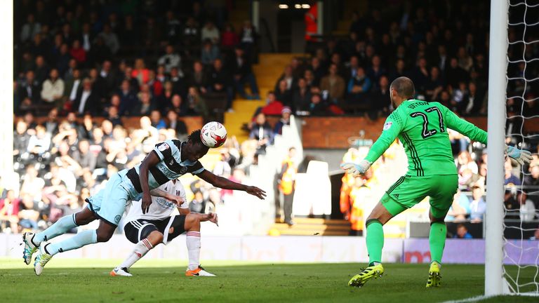 Idrissa Sylla leaps to head the winner at Craven Cottage