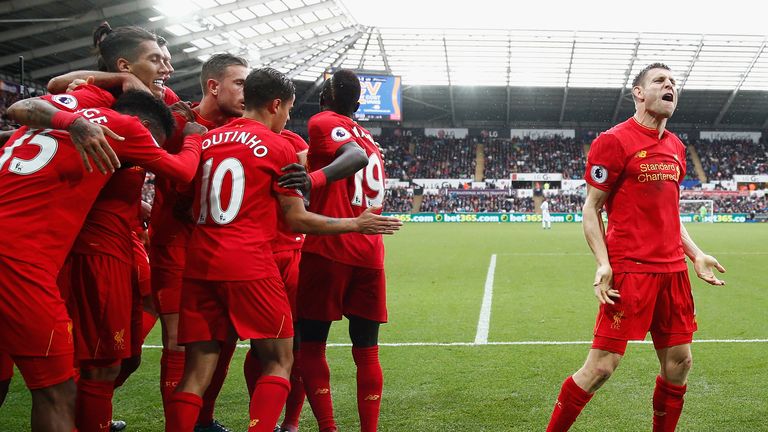 James Milner celebrates his winner for Liverpool