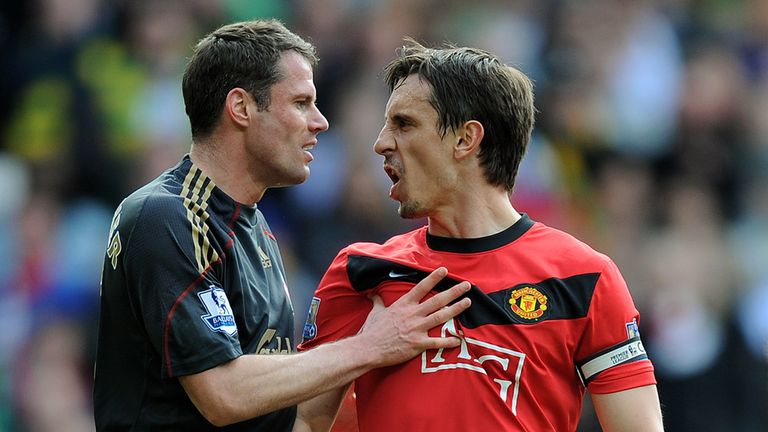 Jamie Carragher (L) of Liverpool argues with Gary Neville of Manchester United after United were awarded a first-half penalty, March 2010, Premier League