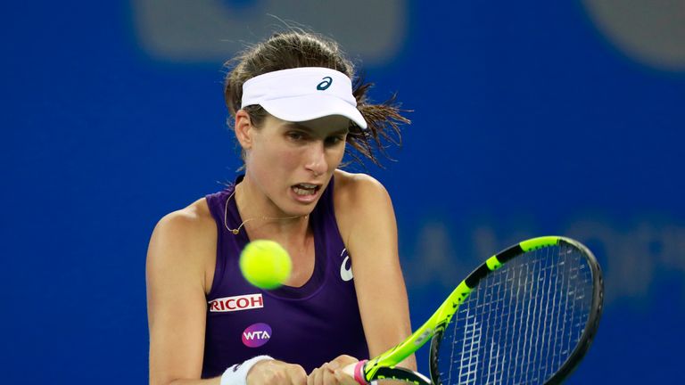 WUHAN, CHINA - SEPTEMBER 29:  Johanna Konta of Great Britain returns a shot to Petra Kvitova of Czech Republic during their fifth round on Day 5 of the 201