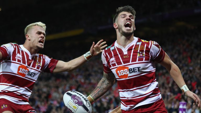 Oliver Gildart (R) of Wigan celebrates scoring his side's opening try in the Super League Grand Final v Warrington