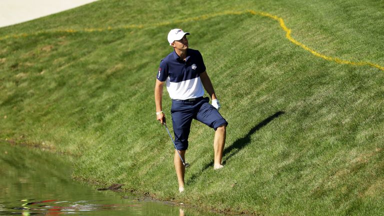 CHASKA, MN - OCTOBER 02:  Jordan Spieth of the United States attempts a stance over his ball on the 17th hole during singles matches of the 2016 Ryder Cup 