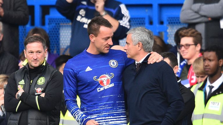 Manchester United manager Jose Mourinho speaks to John Terry 