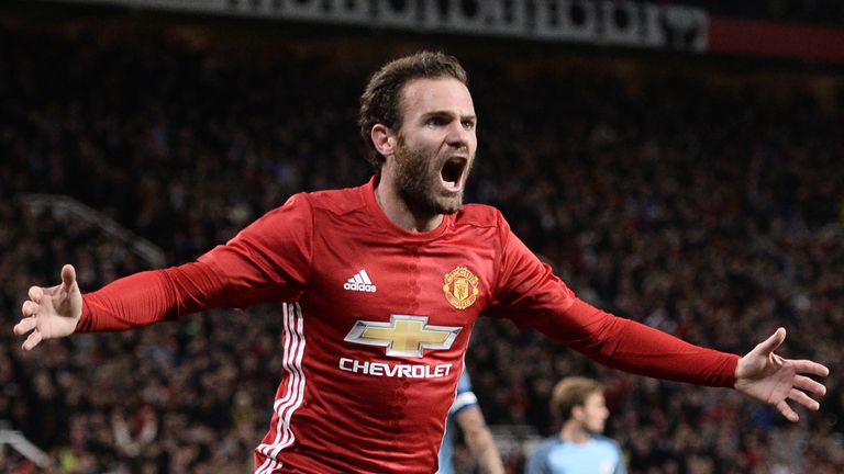 Juan Mata celebrates after scoring the opening goal of the EFL Cup fourth round match between Manchester United and Manchester City