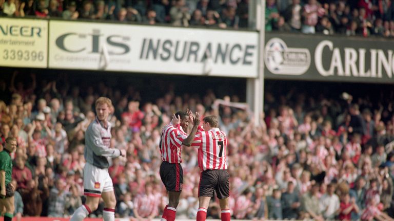 SOUTHAMPTON - APRIL 13 1996:  Ken Monkou celebrates his goal with team-mate Matthew Le Tissier of Southampton during a match against Manchester United