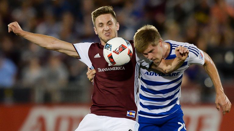 Walker Zimmerman of FC Dallas beats Colorado Rapids' Kevin Doyle - once of Wolves and Reading - to the ball