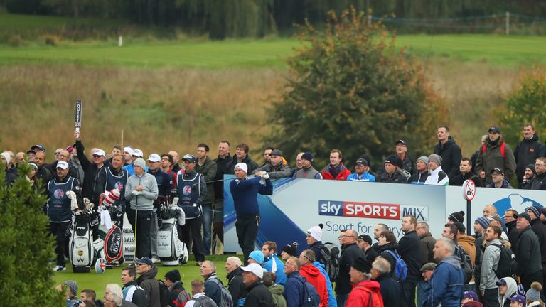 Lee Westwood of England hits his tee shot on the 18th hole during the first round of the British Masters at The Grove