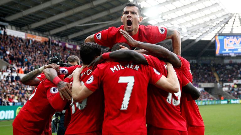 Liverpool celebrate their winner at Swansea