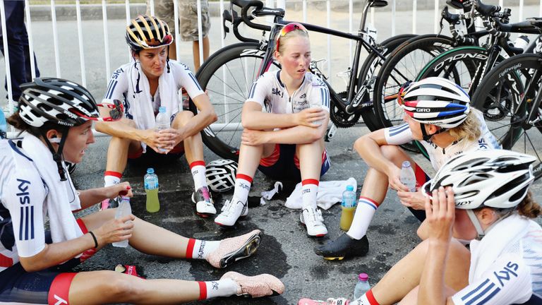 Lizzie Deignan of Great Britain sits on the floor with the rest of the British team at the end of the Elite Womens World Championship Road Race 