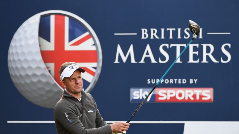 Luke Donald of England hits his tee shot on the fifth hole during the first round of the British Masters at The Grove