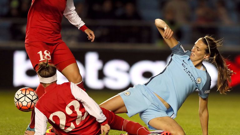 Manchester City's Jill Scott battles for the ball with Zvezda-2005 Perm's Alena Nurgalieva
