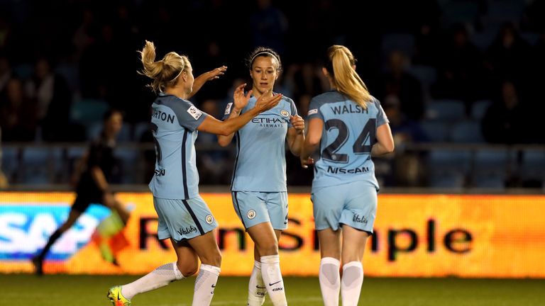 Manchester City's Lucy Bronze (centre) celebrates scoring her side's clinching second goal with her team-mates