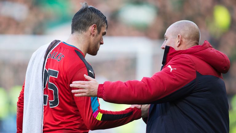 Mark Warburton shakes hands with goalkeeper Matt Gilks at full-time