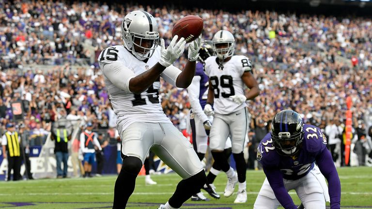 BALTIMORE, MD - OCTOBER 2:  Michael Crabtree #15 of the Oakland Raiders celebrates after scoring a touchdown in the fourth quarter against the Baltimore Ra