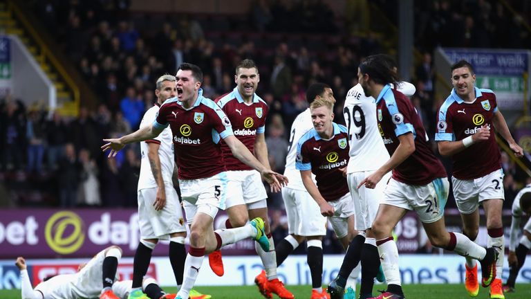 BURNLEY, ENGLAND - SEPTEMBER 26:  Michael Keane of Burnley celebrates scoring his sides second goal during the Premier League match between Burnley and Wat