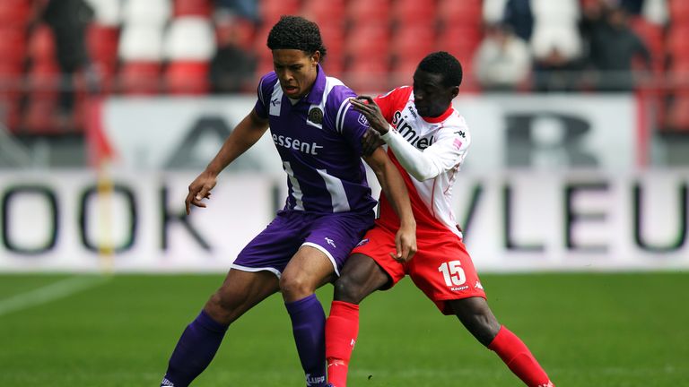Nana Asare of Utrecht and Virgil van Dijk of Groningen battle for the ball during an Eredivisie match
