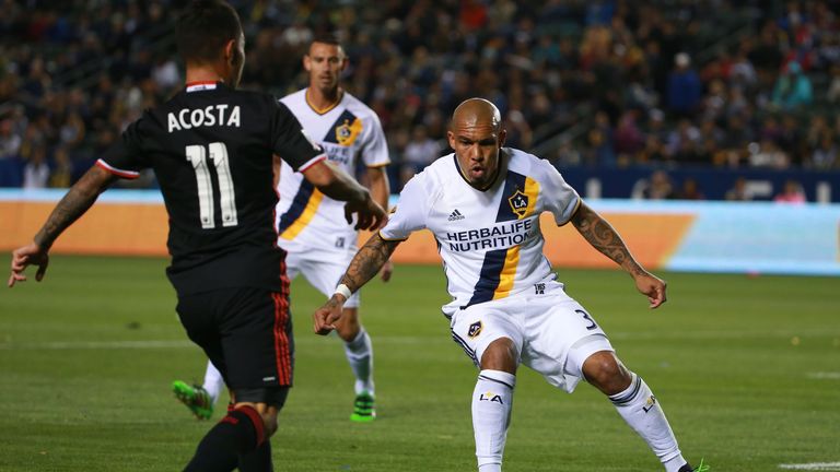 Nigel de Jong of Los Angeles Galaxy pays close attention of D.C. United's Luciano Acosta