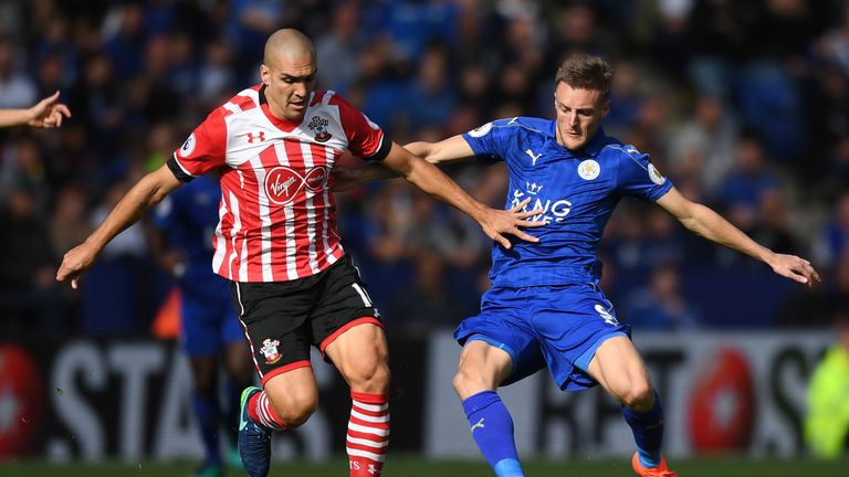 Oriol Romeu of Southampton (L) and Jamie Vardy of Leicester City (R) battle for possession during the Premier League match at the King Power