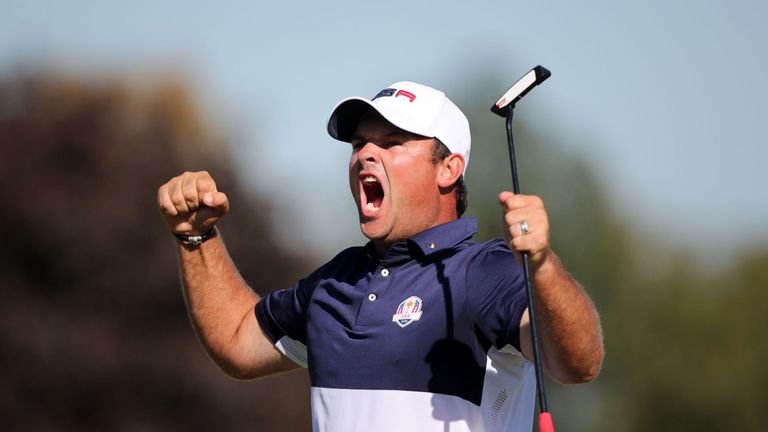 USA's Patrick Reed celebrates winning his round during the singles matches on day three of the 41st Ryder Cup at Hazeltine National Golf Club in Chaska, Mi