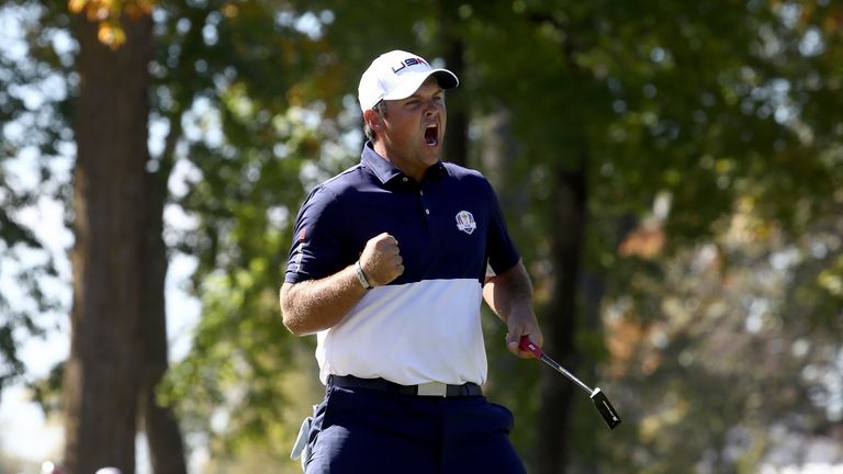 Patrick Reed celebrates a win on the 12th green