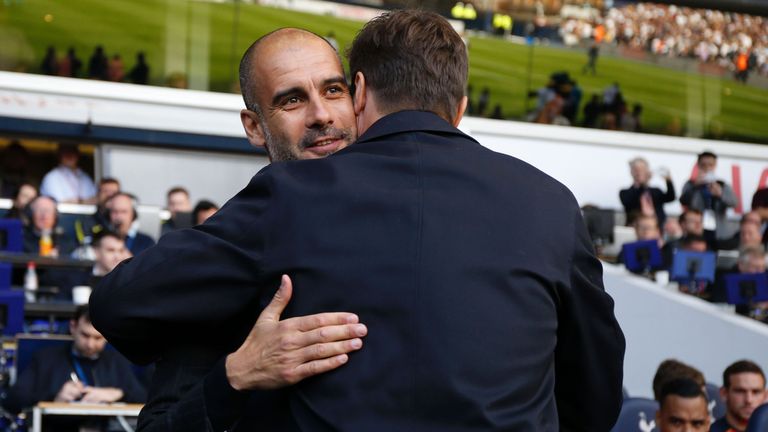 Pep Guardiola hugs Mauricio Pochettino 