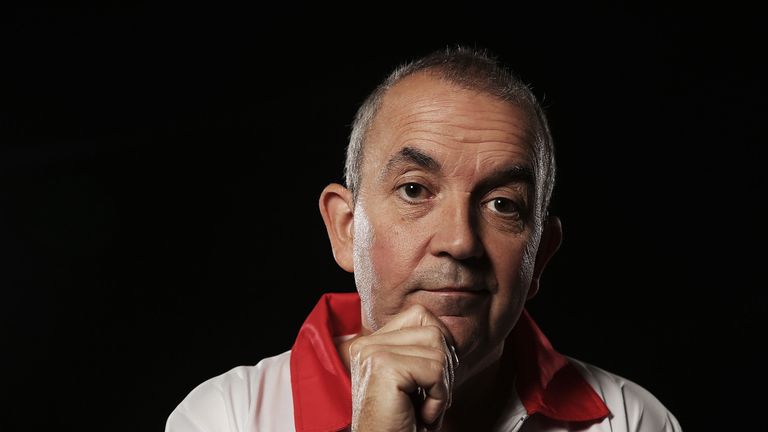 SYDNEY, AUSTRALIA - AUGUST 29:  (EDITORS NOTE: Image has been desaturated) Phil Taylor poses for a portrait ahead of the Sydney Darts Masters at Luna Park 