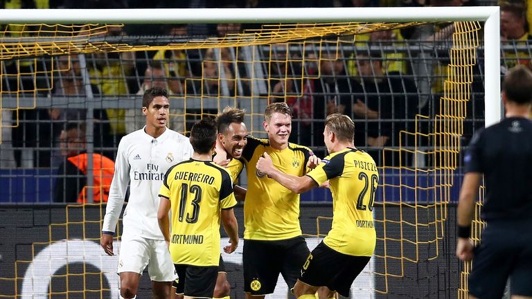 Pierre-Emerick Aubameyang celebrates with team-mates after scoring against Real Madrid