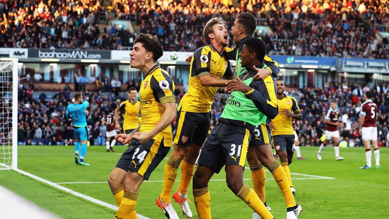 Arsenal players celebrate their late goal against Burnley at Turf Moor