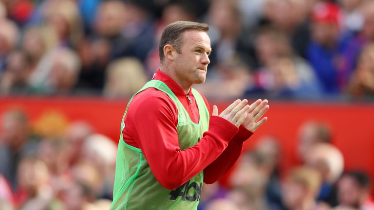 Wayne Rooney appluads the Old Trafford crowd during the  match against Stoke City