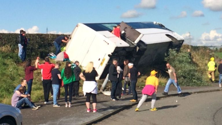 The coach overturned on a roundabout. Picture: @_ryanrowe