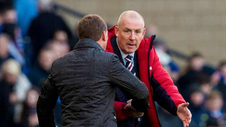 Rangers manager Mark Warburton shakes hands with Brendan Rodgers at full-time