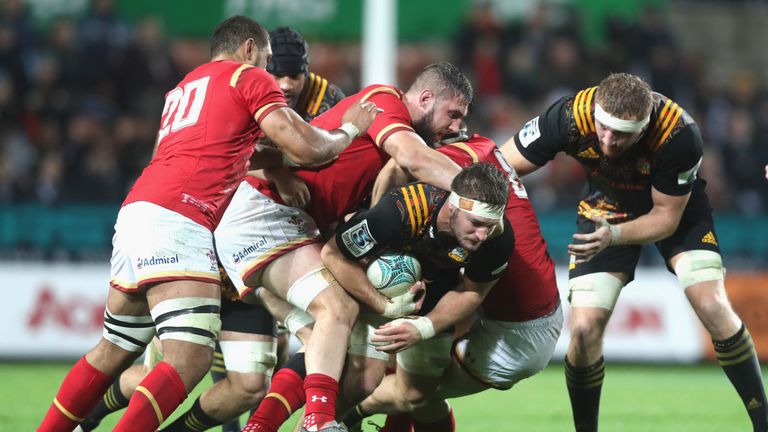 HAMILTON, NEW ZEALAND - JUNE 14: Rhys Marshall of the Chiefs is tackled during the International Test match between the Chiefs and Wales at Waikato Stadium