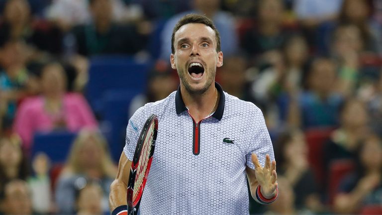 Roberto Bautista Agut of Spain reacts after losing a point against Andy Murray of Great Britain during men's singles final, Shanghai Masters